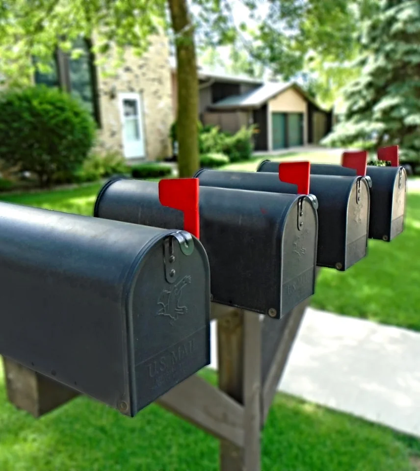 Four Black Mailboxes in a Row